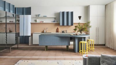 Explore a contemporary kitchen that breaks the outdated rules of kitchen design using color and curves