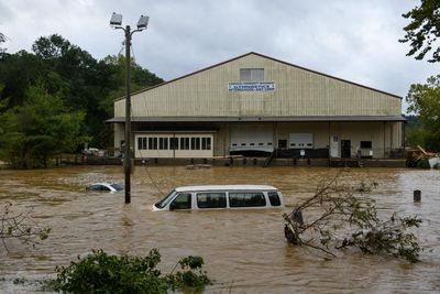 ‘Nowhere is safe’: shattered Asheville shows stunning reach of climate crisis