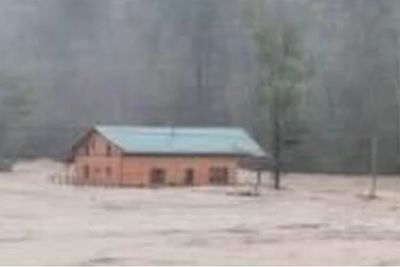 A Mom Went to Check on Her House During the Hurricane. Her Kids Later Received a Photo of It Floating in Floodwaters