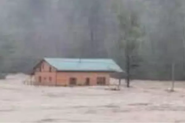 A Mom Went to Check on Her House During the Hurricane. Her Kids Later Received a Photo of It Floating in Floodwaters