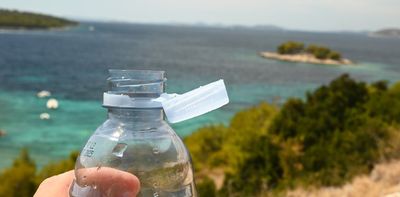 Why plastic bottles now have their caps attached