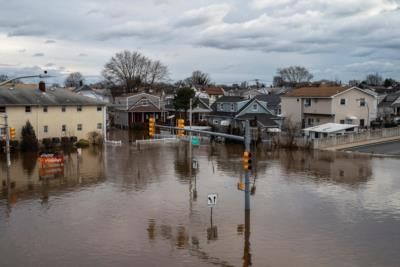 Family Searches For Missing Father And Dog After Flooding