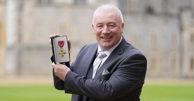 Ally McCoist poses with OBE after ceremony in Windsor