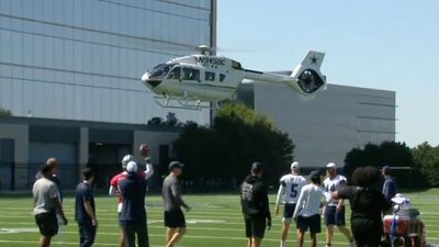 Jerry Jones Interrupts Cowboys Practice by Landing Helicopter on Field