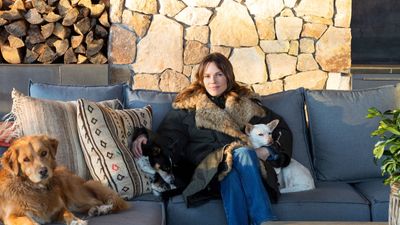 Hilary Swank's wooden cabinets and stone backsplash ground her kitchen – I feel relaxed just looking at the calming yet chic space