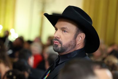 Garth Brooks sued and accused of rape by former makeup artist