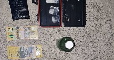 Cash and drug stash allegedly uncovered during car stop