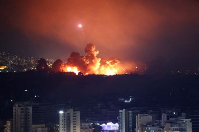 Israel rocks Beirut with huge attack and cuts off main Lebanon-Syria road