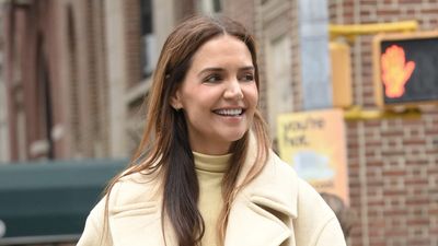 Katie Holmes has just declared this season's biggest coat trend - her creamy yellow outerwear screams sophistication