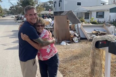 Hero Florida Surfer Used Surfboard to Save Dozens from Homes Flooded by Hurricane: 'That's What Neighbors Do'