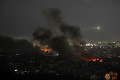 Israel strikes Lebanon, hitting Beirut suburbs and the north