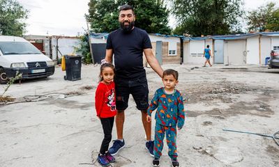 ‘We’re living like wild animals’: Europe’s largest shantytown waits in vain for power