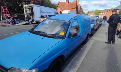 Traffic wardens issue tickets for vehicles on Daniel Day-Lewis film set