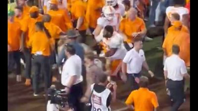 Tennessee Lineman Shoves Arkansas Fan Rushing Field After Upset at Razorback Stadium