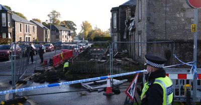 Man killed and several injured after explosion at Scottish flats