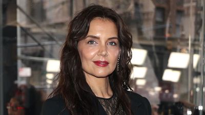 Katie Holmes' sultry sheer lace dress and black blazer blend is so gorgeous it made us gasp - and her vampy red lip took the look to the next level