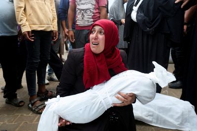 Israeli strikes kill dozens in Gaza as grisly anniversary passes