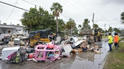 Lifeguards Remove Debris Ahead Of Hurricane Milton's Landfall