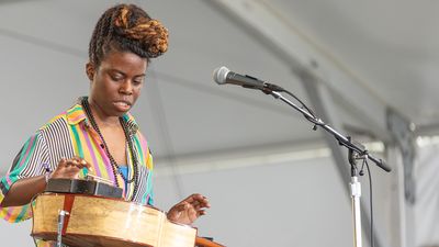 “The game shaped my experimental approach to guitar. On really tricky levels, I’d put the controller in my lap and hammer the buttons super-fast”: Yasmin Williams on how Guitar Hero inspired her lap-tapping acoustic technique