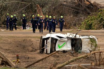 US emergency crews struggle as climate crisis fuels ‘unprecedented’ competing disasters