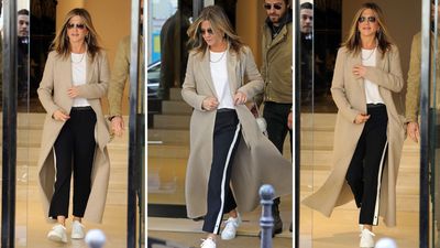 Jennifer Aniston’s cool white trainers and long camel coat combination will always look put-together with minimal effort