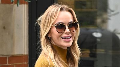 Amanda Holden's striking bumble bee-style outfit featuring a chic satin skirt is so unique it made us do a double take