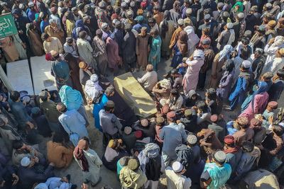 Gunmen kill 20 miners in an attack in southwest Pakistan ahead of an Asian security summit