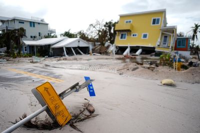 The Latest: Residents begin repairing damage from Hurricane Milton, which killed at least 8