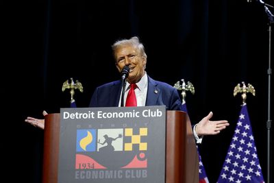 In Detroit, Trump bashes Detroit