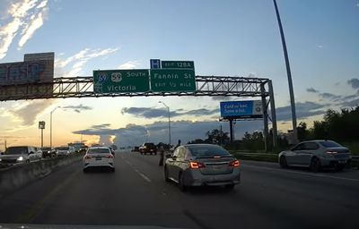 Drivers Angered After Houston Couple Halts Traffic For Highway Photo Shoot