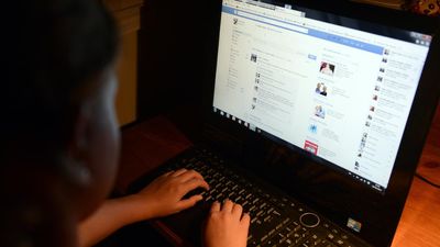 Protect children from online hellholes, spy chief urges