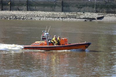 Urgent River Thames search for man after rowing boat capsizes with six on board