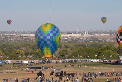 Hot-air balloon strikes and collapses radio tower in Albuquerque during festival