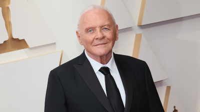 Anthony Hopkins makes the most of a 'dead space' with warm neutrals, statement lighting, and stone furniture – experts love his underrated technique