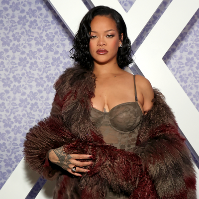 Rihanna Sizzles in an Opulent Lace Bodysuit and Fur Coat