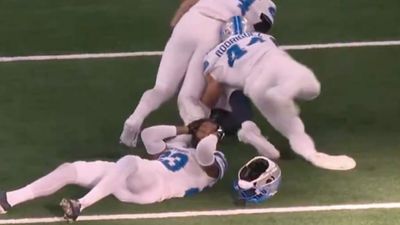 Lions' Carlton Davis III Loses Helmet, Gets Kicked in Head by Teammate