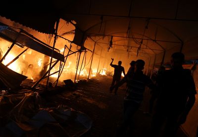 Israeli attack on Gaza hospital tent camp kills four, ignites fire