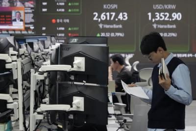 Asian Shares Rise As China Considers More Economic Stimulus