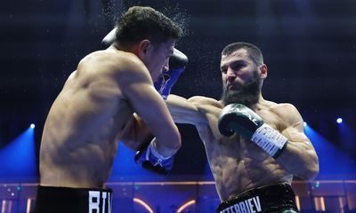 Artur Beterbiev beats Dmitry Bivol on points to become undisputed champion