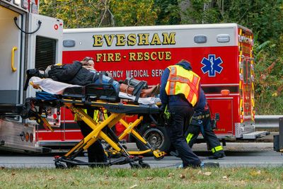 Operator dies and passengers injured as New Jersey commuter train hits a piece of a tree