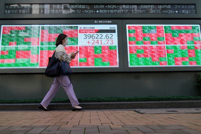 Stock market today: Asian shares are mostly higher after Wall St powers to more records