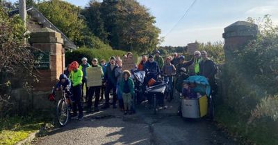 Community stages protest over 'locked gate' blocking them from country park