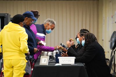 Record turnout in Georgia state as early voting begins in US election