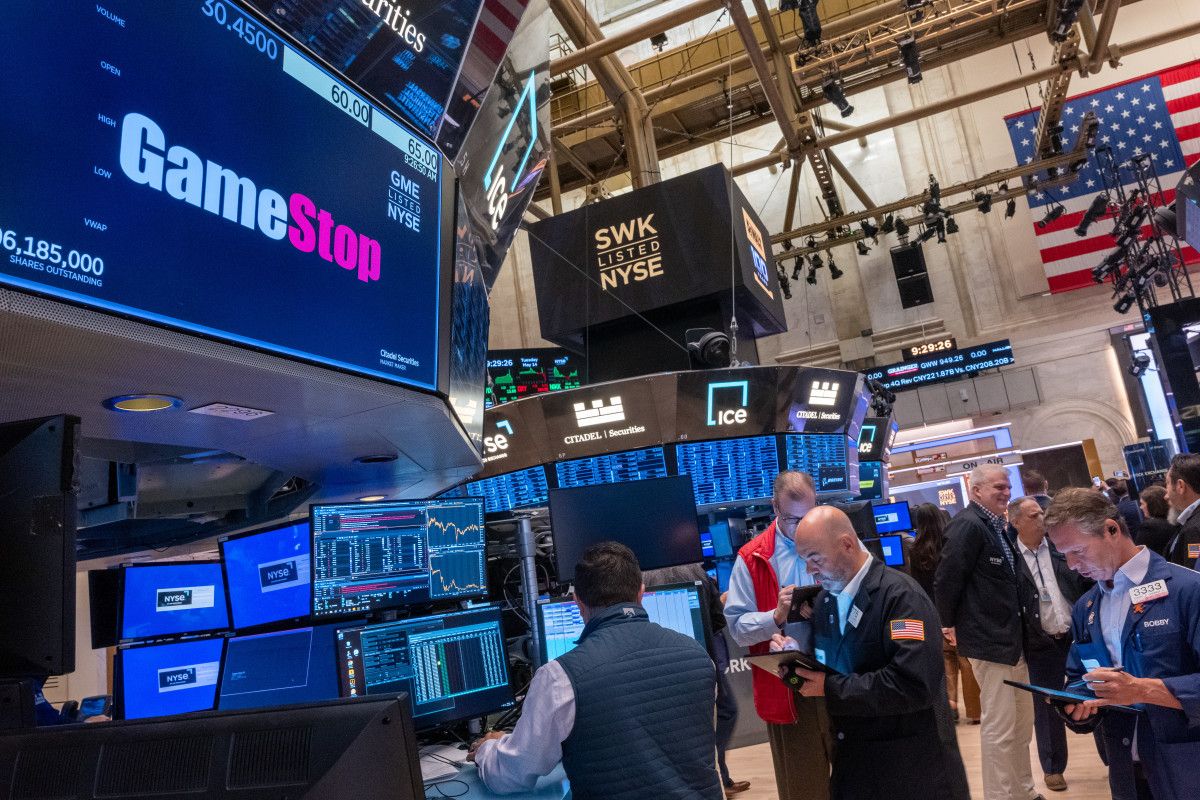 Stock Market Today Stocks end as Dow posts record…