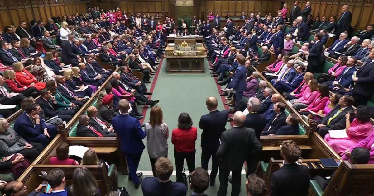 Why are MPs wearing pink clothes and ribbons at PMQs?