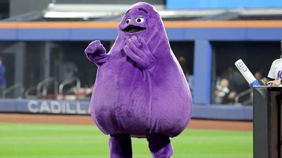 Grimace Billboard Menacingly Lurks Over Times Square Ahead of Mets-Dodgers Game 3