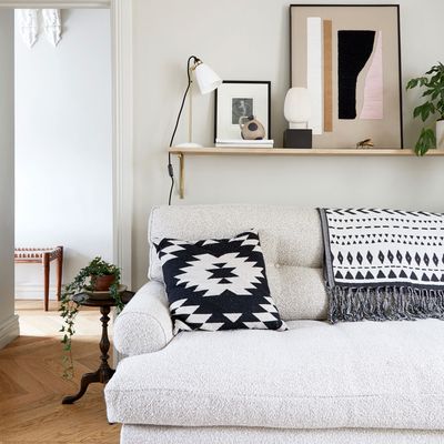 The golden rule for how tall a side table next to a sofa should be - according to design pros