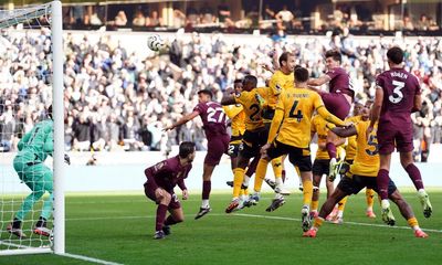 John Stones’ injury-time header gives Manchester City dramatic win at Wolves