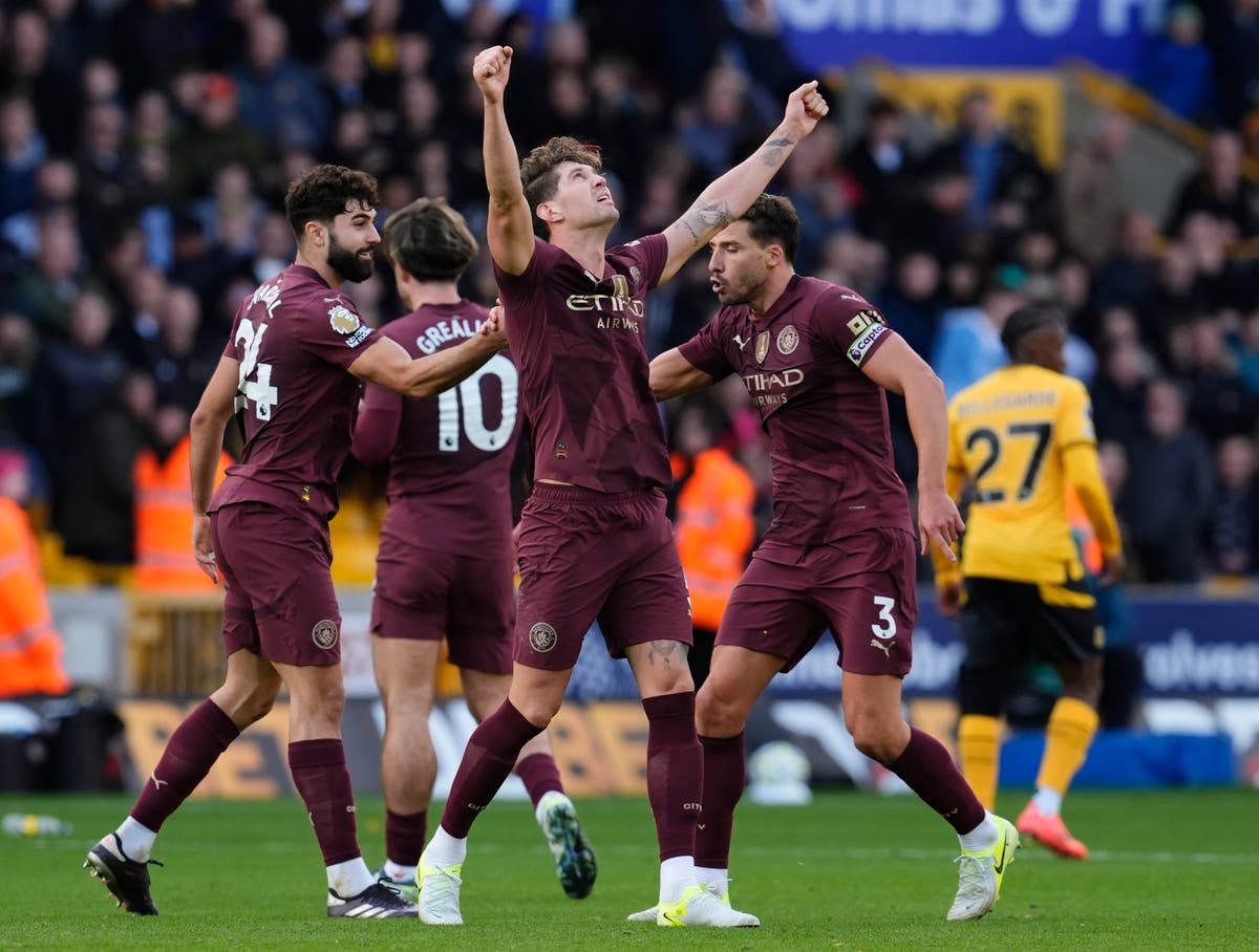 John Stones strikes late as Man City beat Wolves with…
