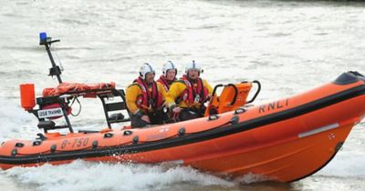 Emergency services rescue family-of-three from water during Storm Ashley